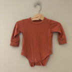 goumi burnt orange bodysuit 6-12M