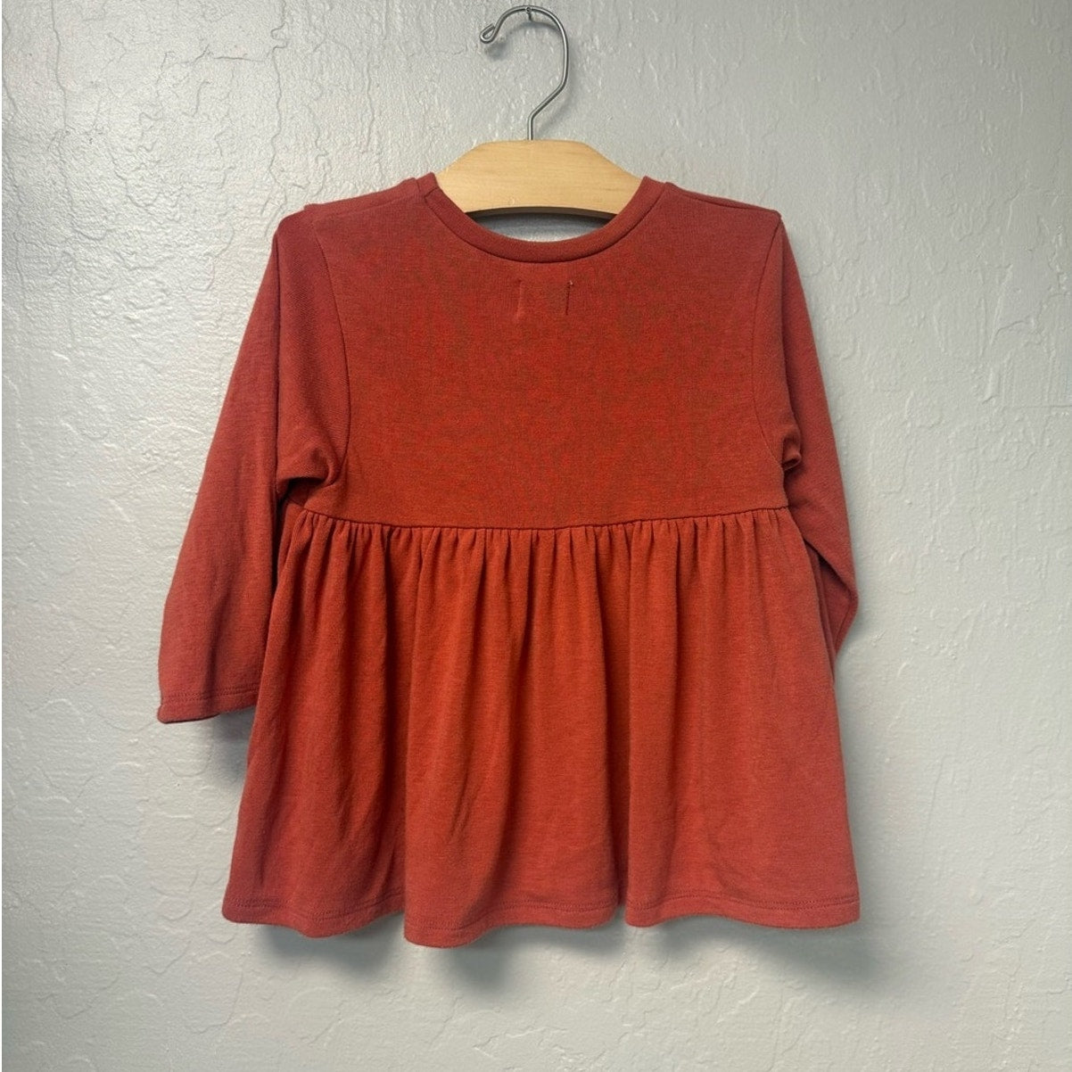 figge burnt orange peplum top long-sleeve 5Y
