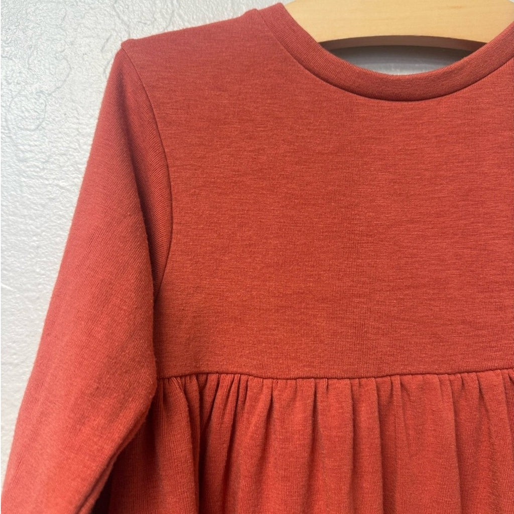figge burnt orange peplum top long-sleeve 5Y