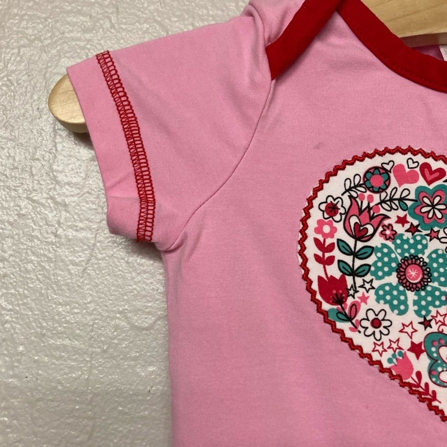 hanna girls’ romper with‎ heart graphic 6-12M