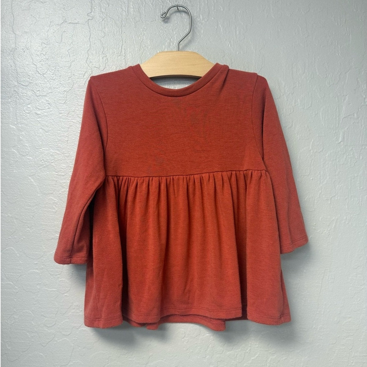 figge burnt orange peplum top long-sleeve 5Y