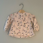 Back view of Baby Gap pink bird print long-sleeve blouse with button closure for girls 2T