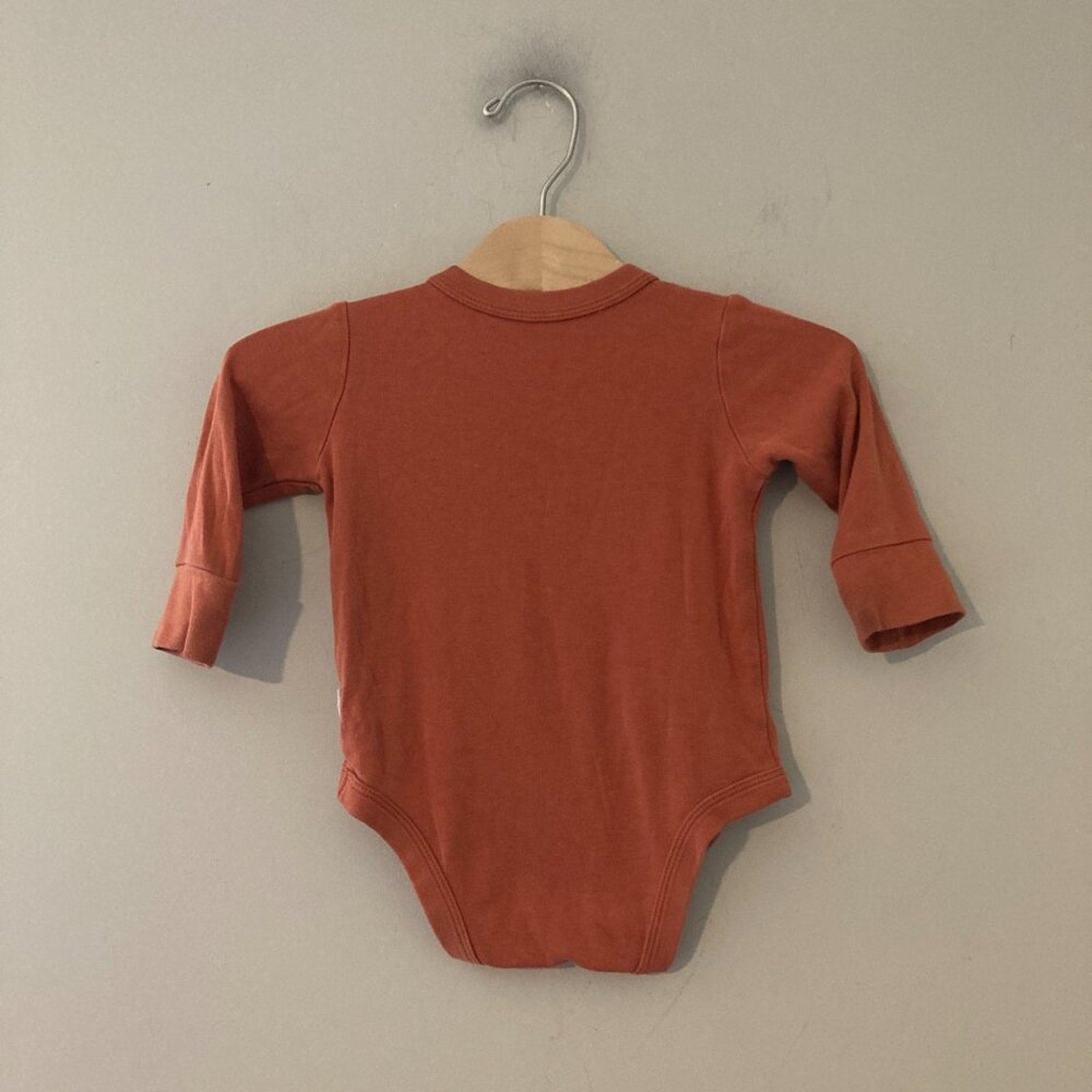 goumi burnt orange bodysuit 6-12M