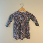 Back view of H&M black multicolor floral long-sleeve gathered A-line dress for girls size 3 years