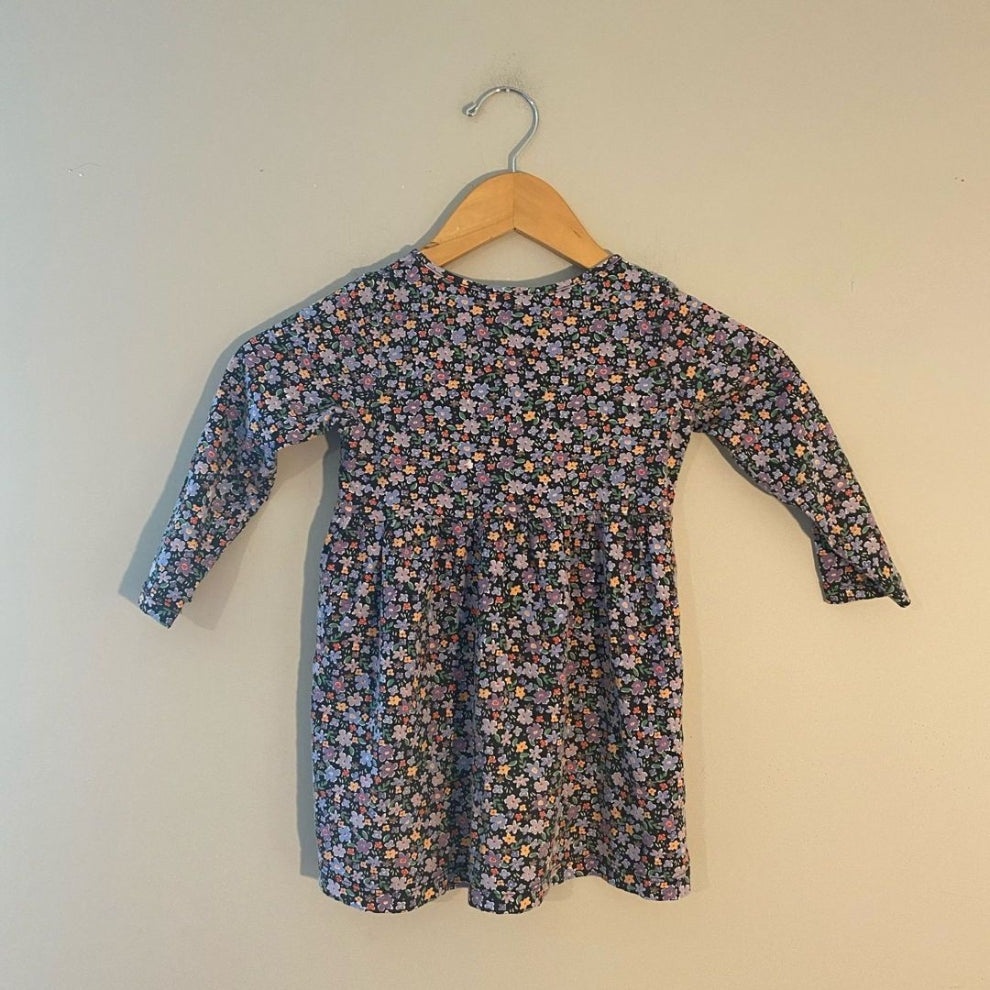 Back view of H&M black multicolor floral long-sleeve gathered A-line dress for girls size 3 years