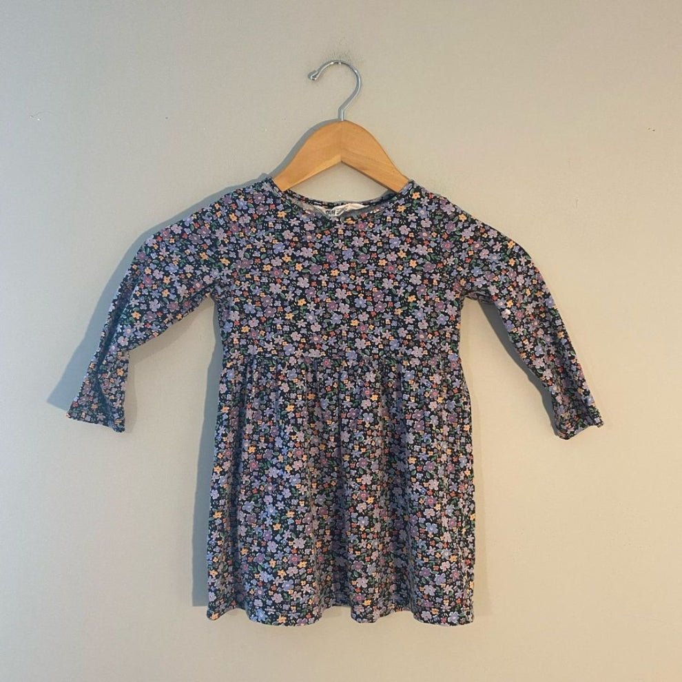 ront view of H&M black all-over ditsy floral print long-sleeve gathered waist girls dress, size 3Y