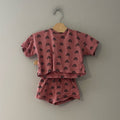 Front view of Indy + Pippa mauve all-over rainbow print matching boxy tee and shorts set for baby girls 9-12 months