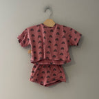 Front view of Indy + Pippa mauve all-over rainbow print matching boxy tee and shorts set for baby girls 9-12 months