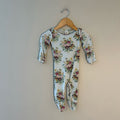 Front view of Kate Quinn light blue bamboo romper with vintage floral bouquet print and long sleeves for baby girls size 6-9 months