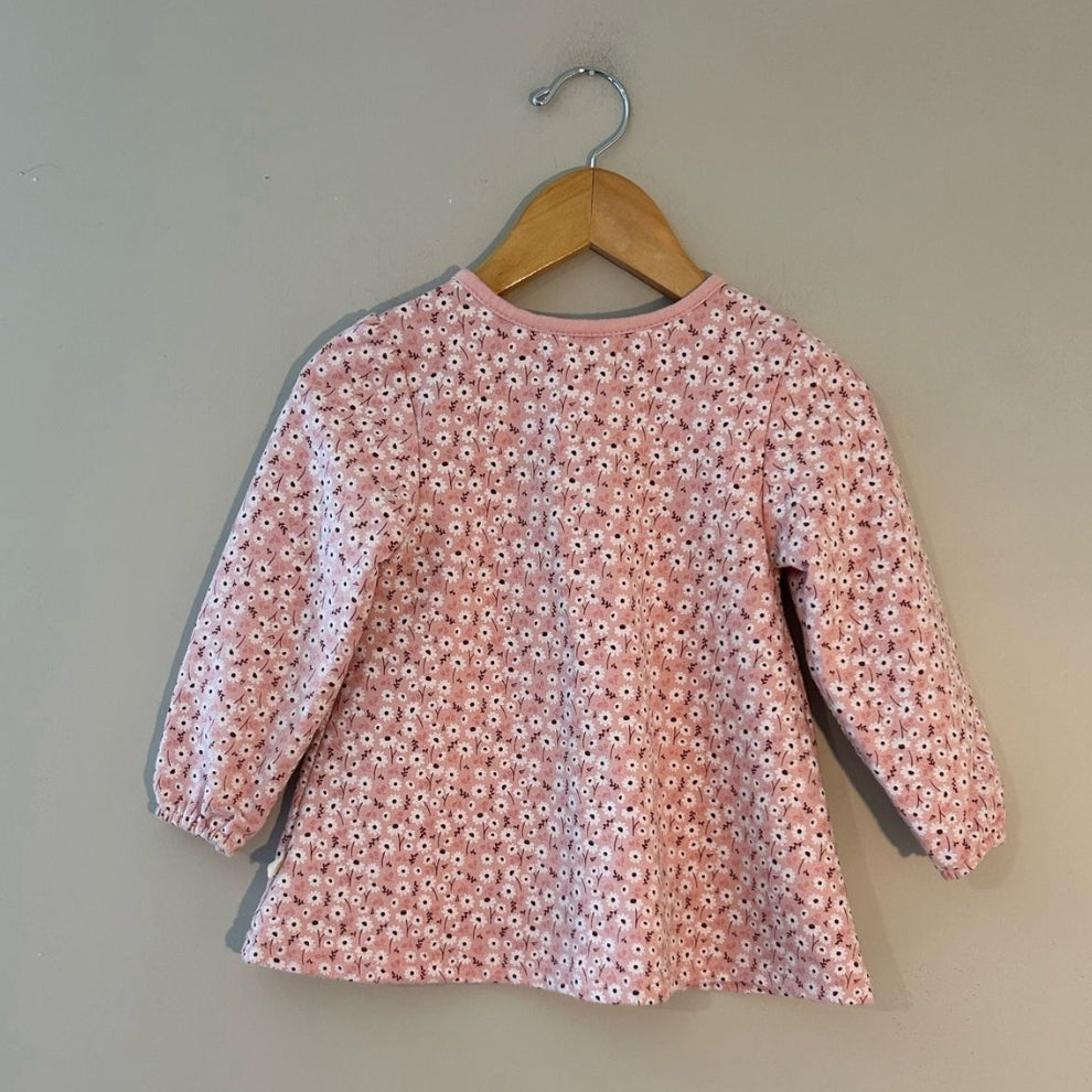 Back view of Kit + Pearl pink ditsy daisy floral long-sleeve dress in organic cotton for girls 24 months