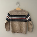 Front view of Mayoral oatmeal beige wool-blend knit sweater with color-block gray and red stripe for boys size 5Y