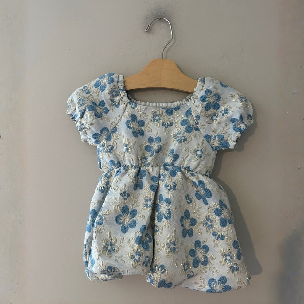Front view of Peek ivory blue floral jacquard bubble dress with puff sleeves for baby girls 6-12 months