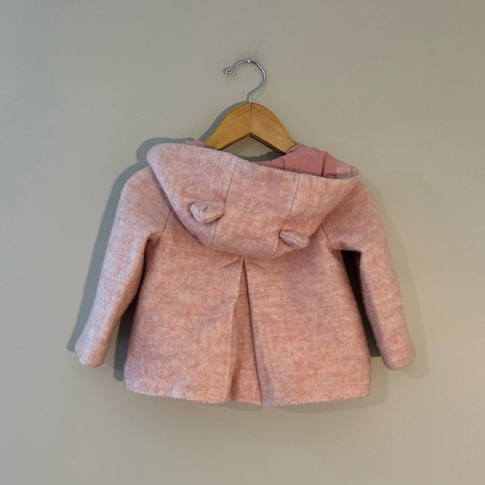 Back view of Zara BabyGirl blush pink hooded coat with bear ear hood detail and back box pleat for girls 18-24 months