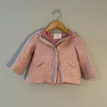 Front view of Zara BabyGirl blush pink wool-blend zip hooded coat with oval pockets and bear ear hood for girls 18-24M