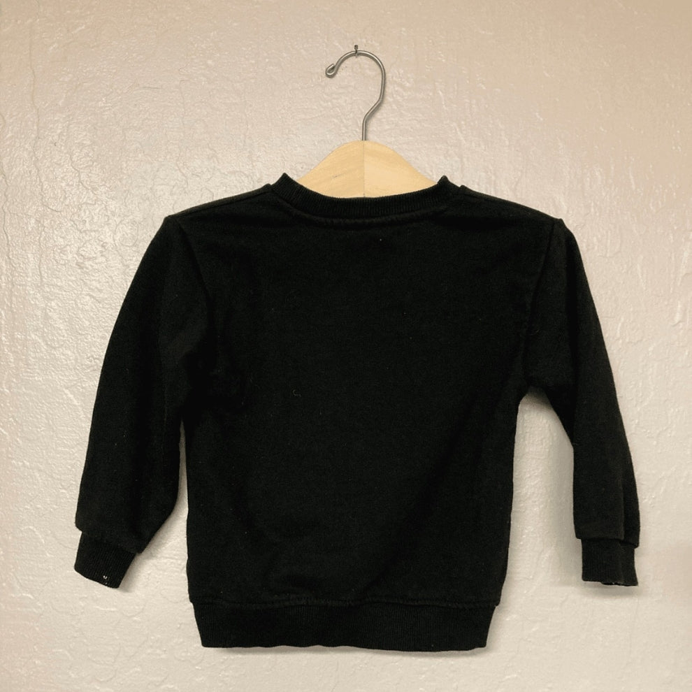 Back view of Zara black crewneck sweatshirt with ribbed cuffs for boys