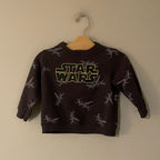 Front view of Zara black Star Wars crewneck sweatshirt with X-Wing print for boys