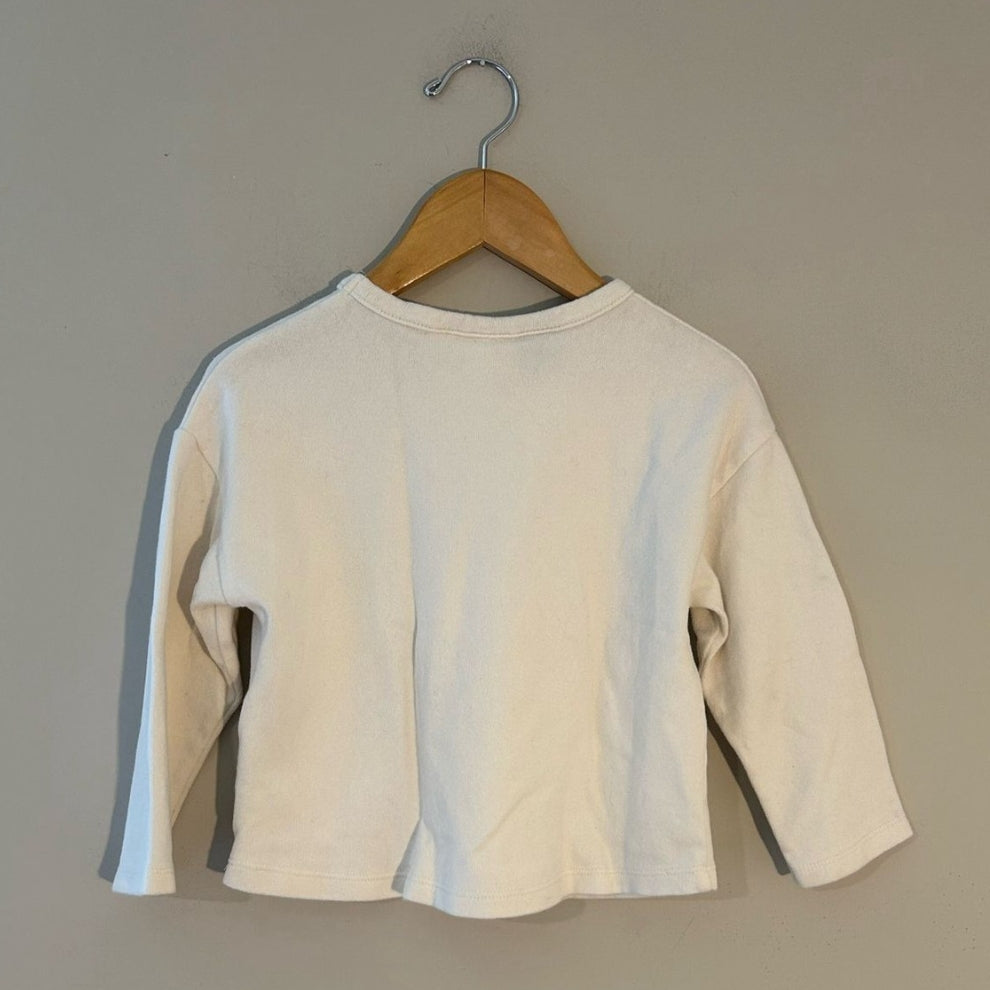 Back view of Zara x Disney cream pullover sweatshirt for girls size 3-4Y