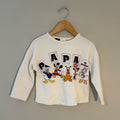 Front view of Zara Disney cream pullover with Papa Te Quiero Spanish text and Disney characters for girls 3-4 years