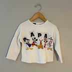 Front view of Zara Disney cream pullover with Papa Te Quiero Spanish text and Disney characters for girls 3-4 years