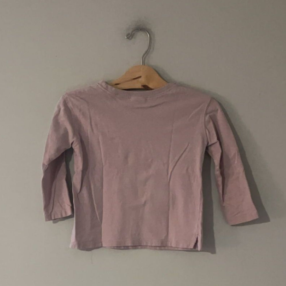 Back view of Zara lavender purple long-sleeve t-shirt with puff sleeves for girls