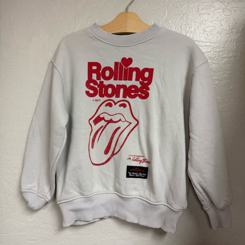 Front view of a Zara light gray girls’ Rolling Stones sweatshirt in size 8–9 years with red logo and tongue graphic.